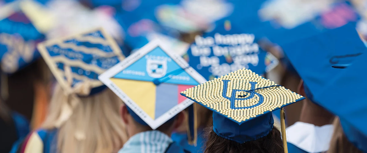 graduation caps at UD graduation