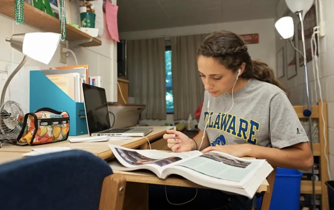 UD Student studying diligently in their Residence Hall